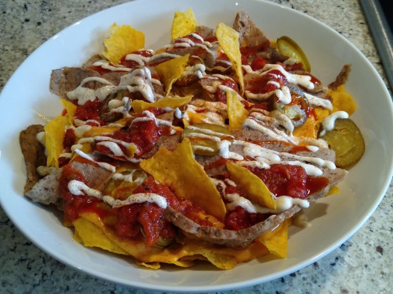 Nachos Topped with Donner Meat, Cheese, Jalapenos & Salsa